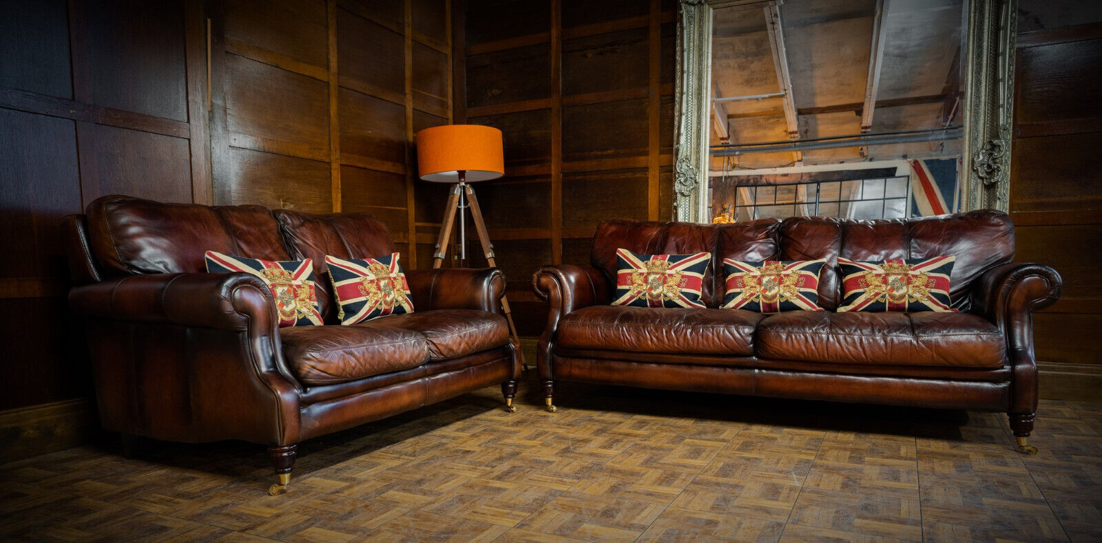 Hand-dyed leather sofa suite with Union Jack cushions in our studio